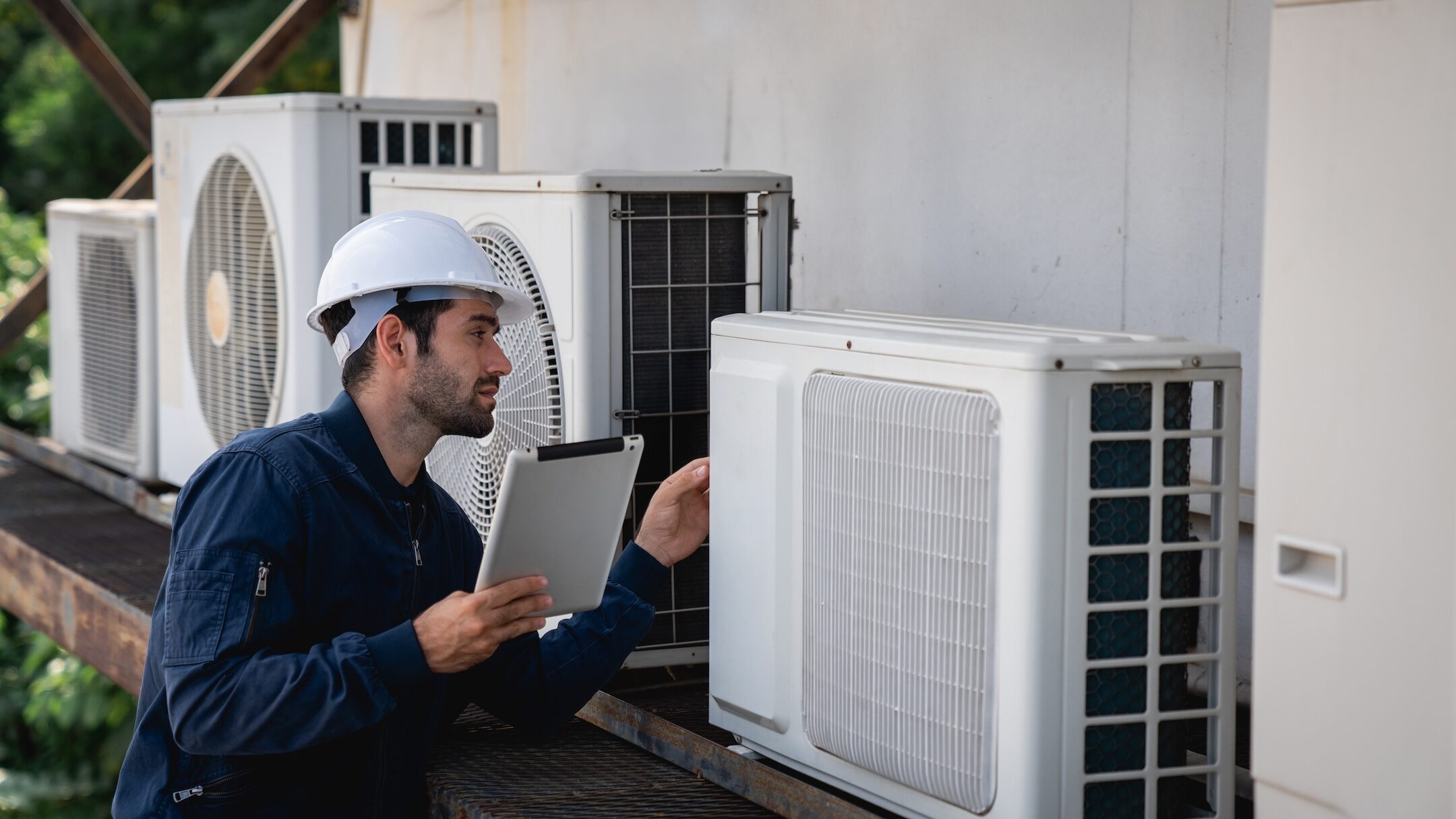 Engineers is checking the air conditioning cooling system of a major building or industrial facility.